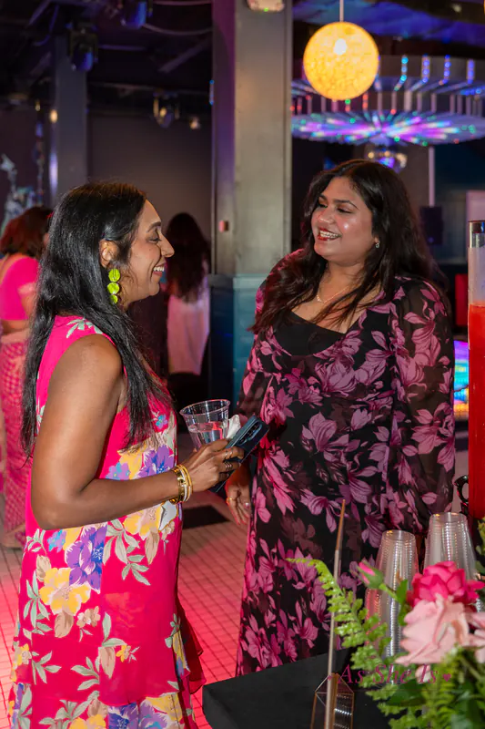 A tender moment of connection between two women at the brunch